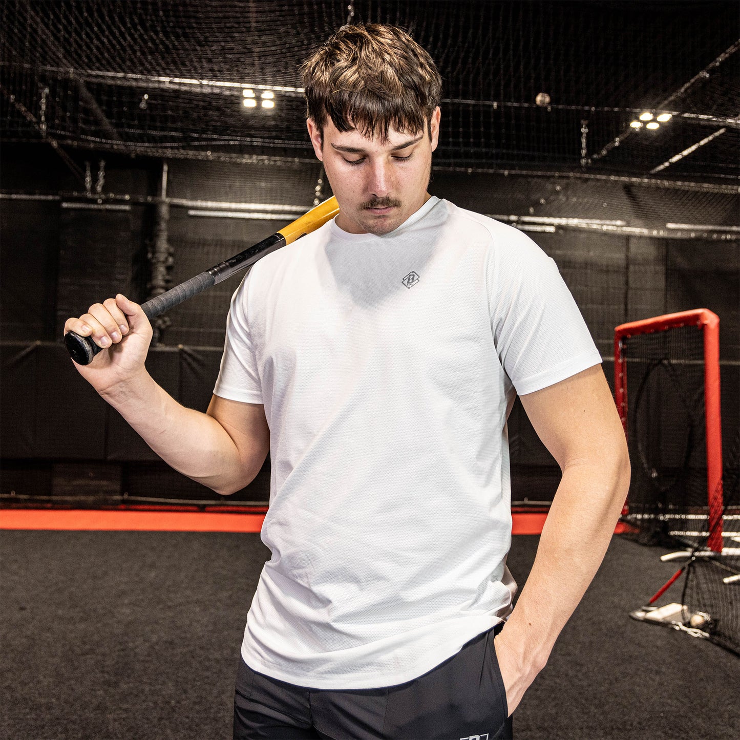 athlete wearing navy athletic shirt