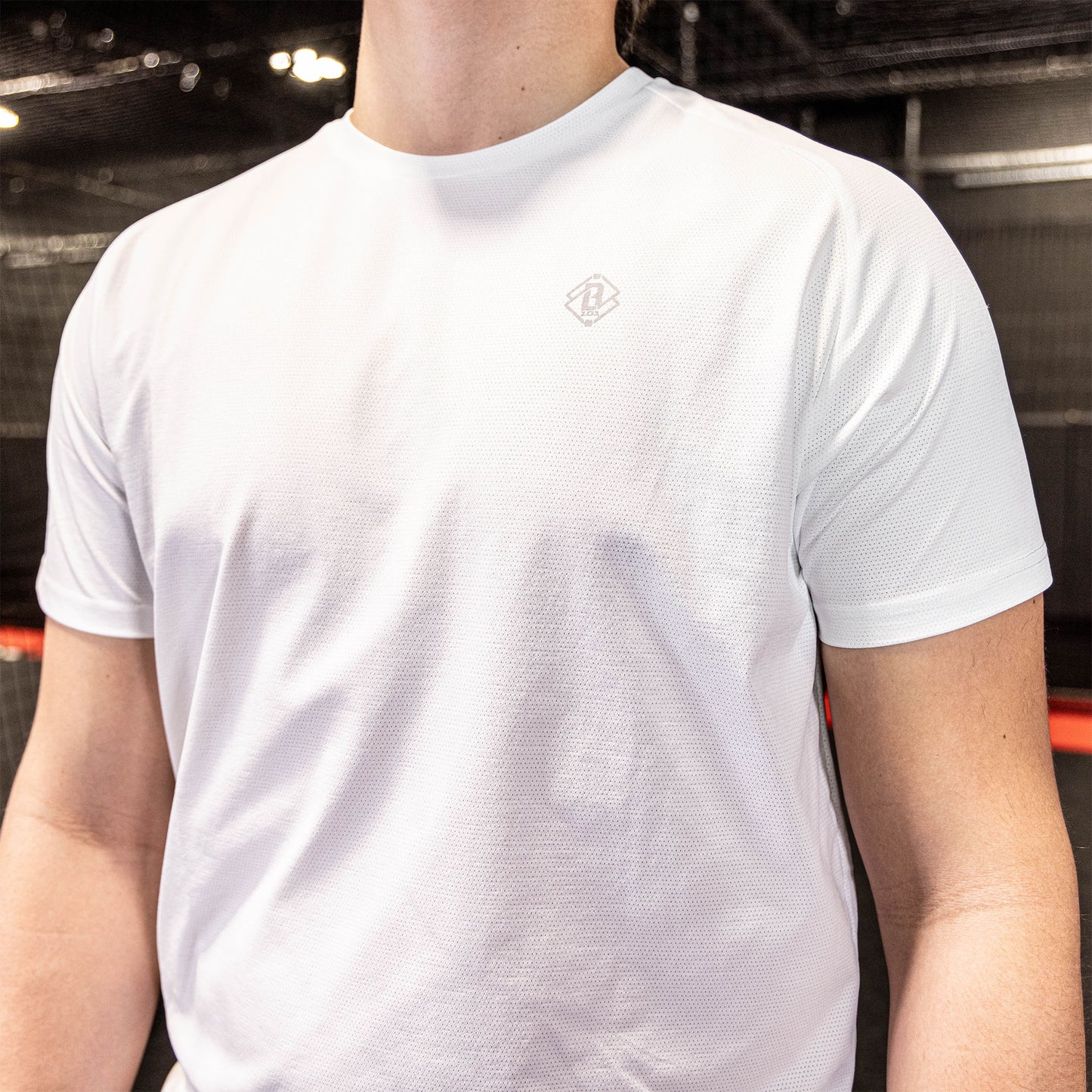 athlete wearing white athletic shirt